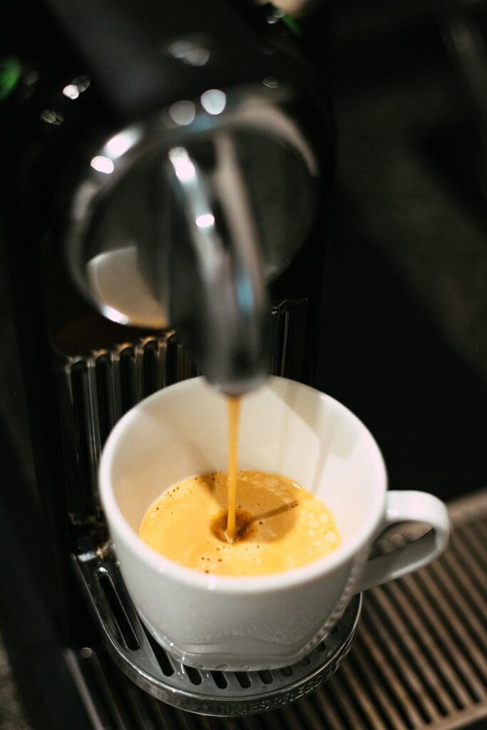Nespresso machine brewing espresso