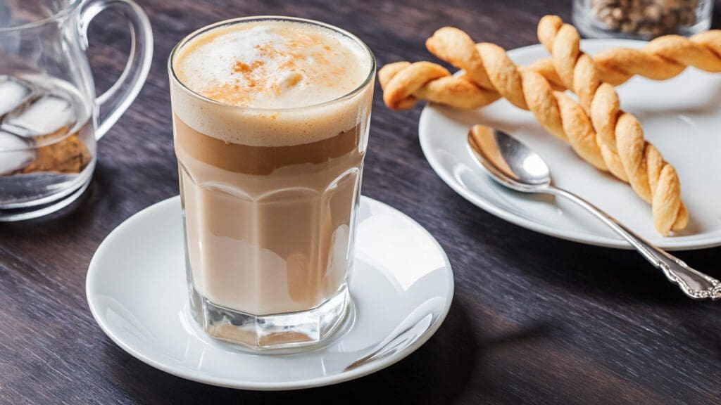 a lechero in a tall glass 