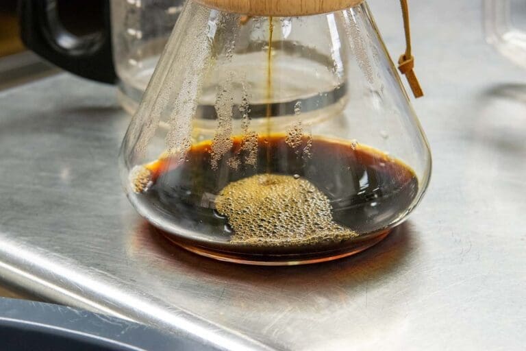 Best Coffee for Chemex: Why Light to Medium Roasts Work Best Fresh coffee dripping through a Chemex brewer