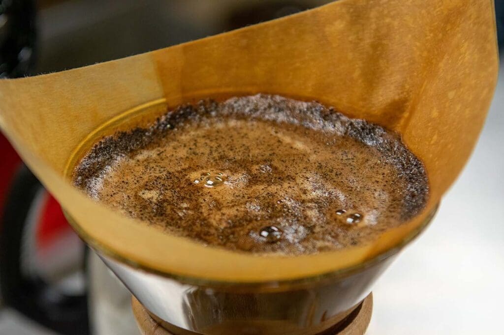 Blooming coffee grounds in a Chemex paper filter