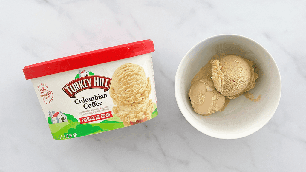 Does Turkey Hill Coffee Ice Cream Have Caffeine – container of Colombian Coffee flavor next to a bowl with scoops