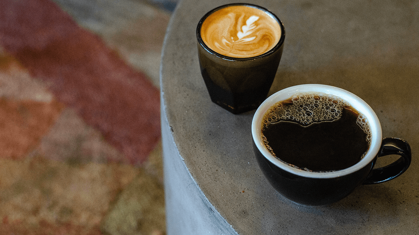 Why Cuban Colada Will Hit You Harder Than an Espresso Shot Ever Should Two distinct brews—one bold, one smooth—rest on a table.