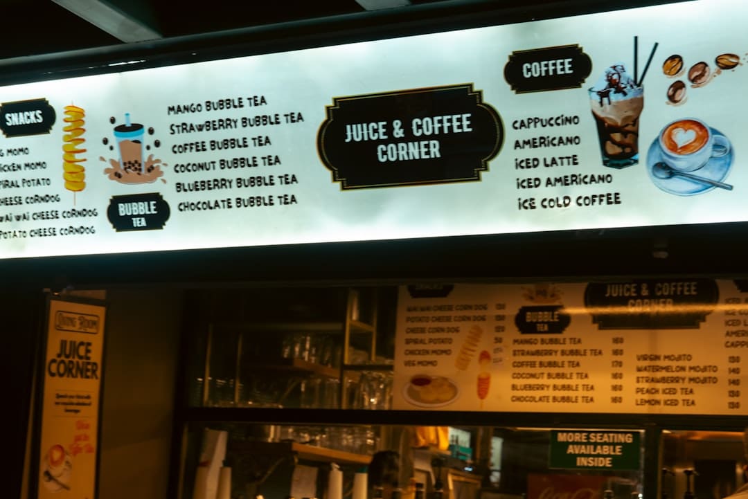 Juice and coffee menu board with bubble tea options