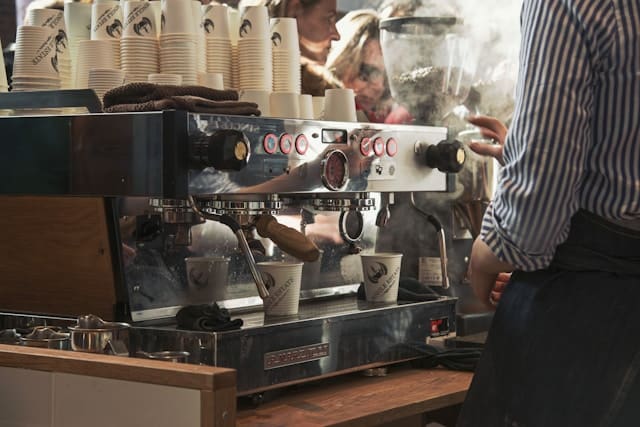 A well-pulled espresso shot with rich crema in a white cup