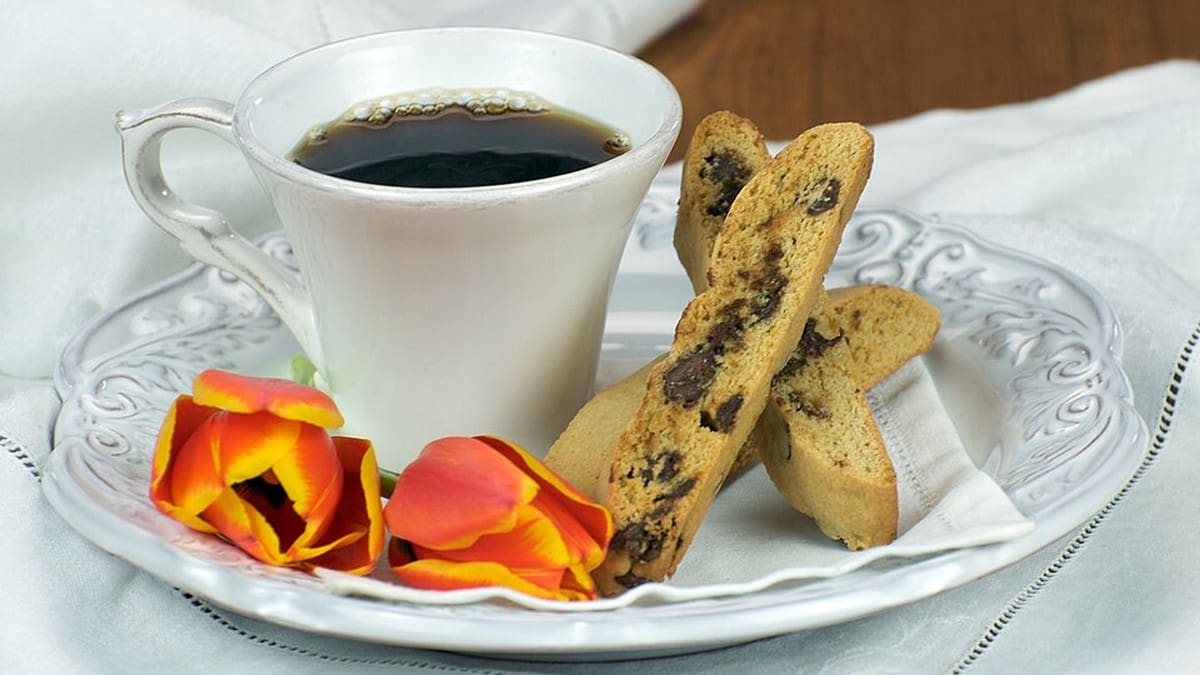 Coffee served with chocolate chip biscotti